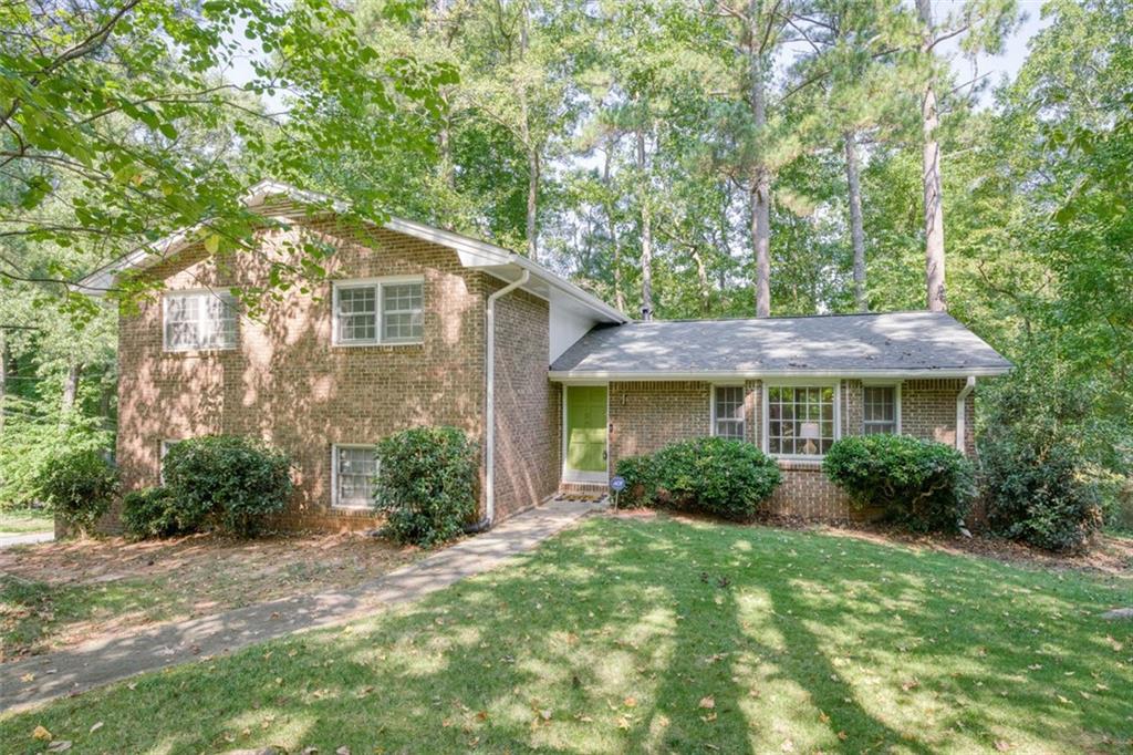 1190 Sanden Ferry Drive Decatur, GA 30033 - Photo 1 of 1 a view of a big yard in front of a house
