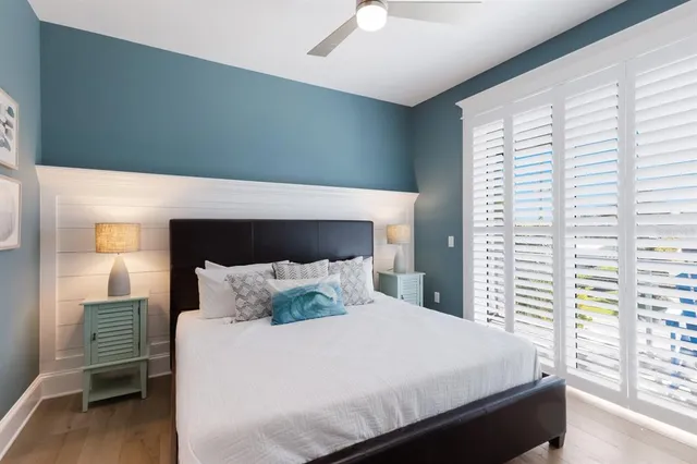 a kitchen with a sink cabinets and a window