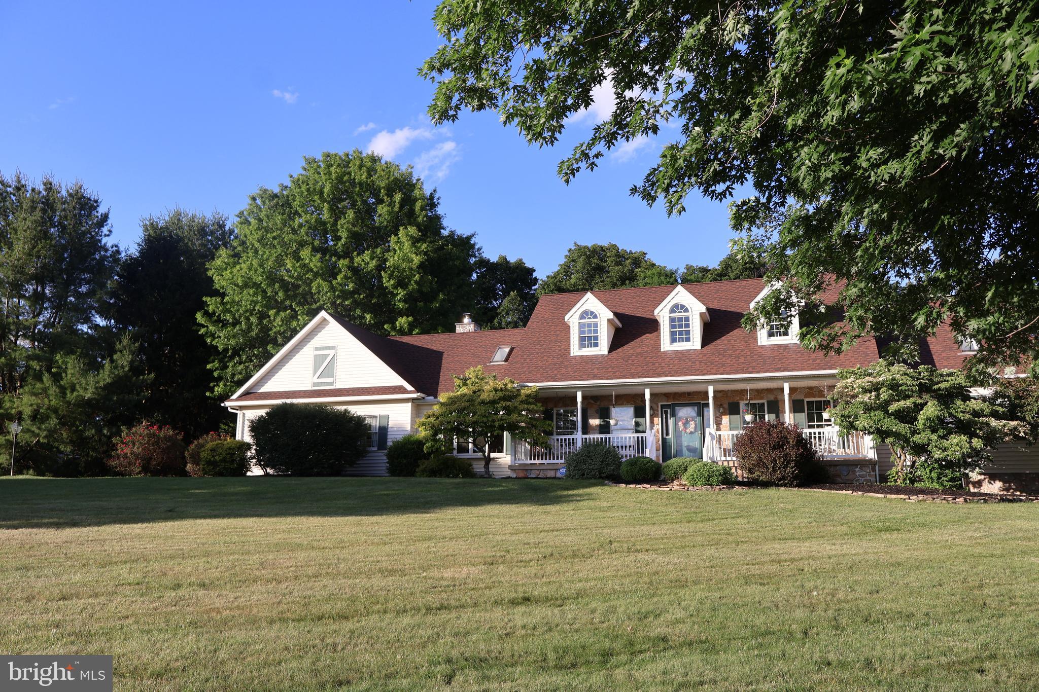 509 Buchland Road Narvon, PA 17555 - Photo 4 of 94 a front view of a house with a yard