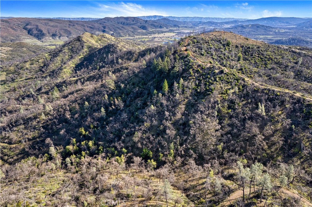 1160 Aetna Springs Road Pope Valley, CA 94567 - Photo 5 of 13 a view of a city with mountains in the background
