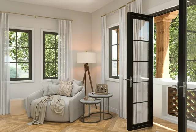 a black and white photo of a living room