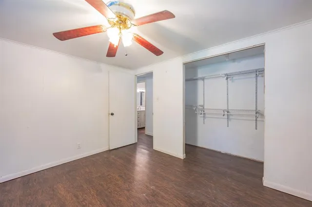 a view of a chandelier fan in a room