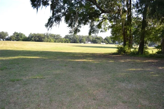 a view of outdoor space and yard