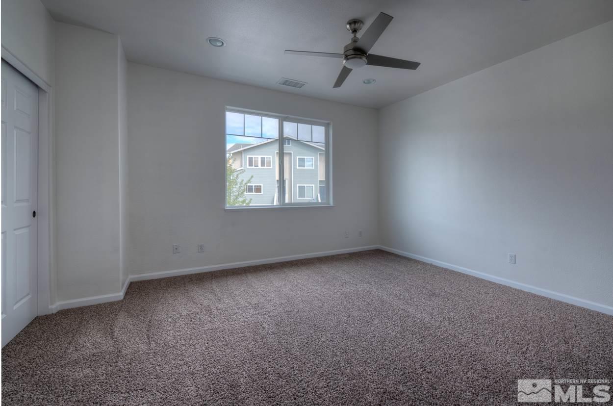 4800 Ciarra Kennedy Lane Reno, NV 89503 - Photo 16 of 25 an empty room with a window