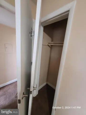 a bathroom with a shower and a toilet