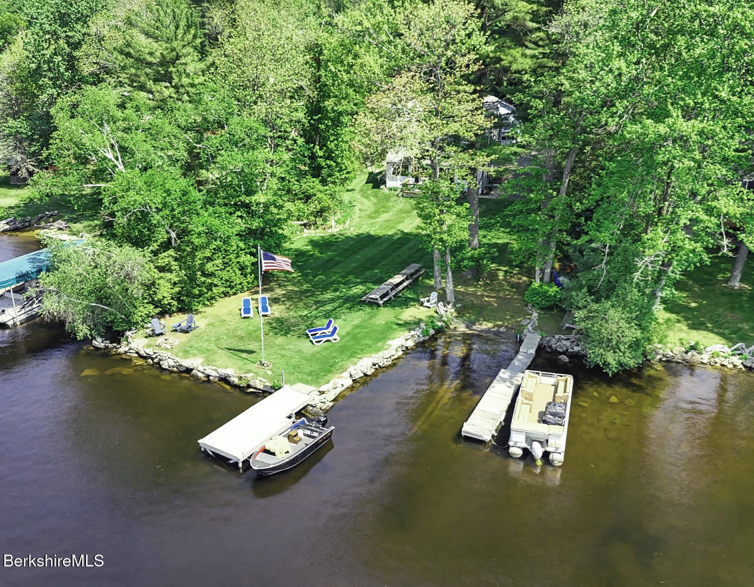 191 Moreau Road Granville, MA 01034 - Photo 1 of 4 a view of a lake with a yard