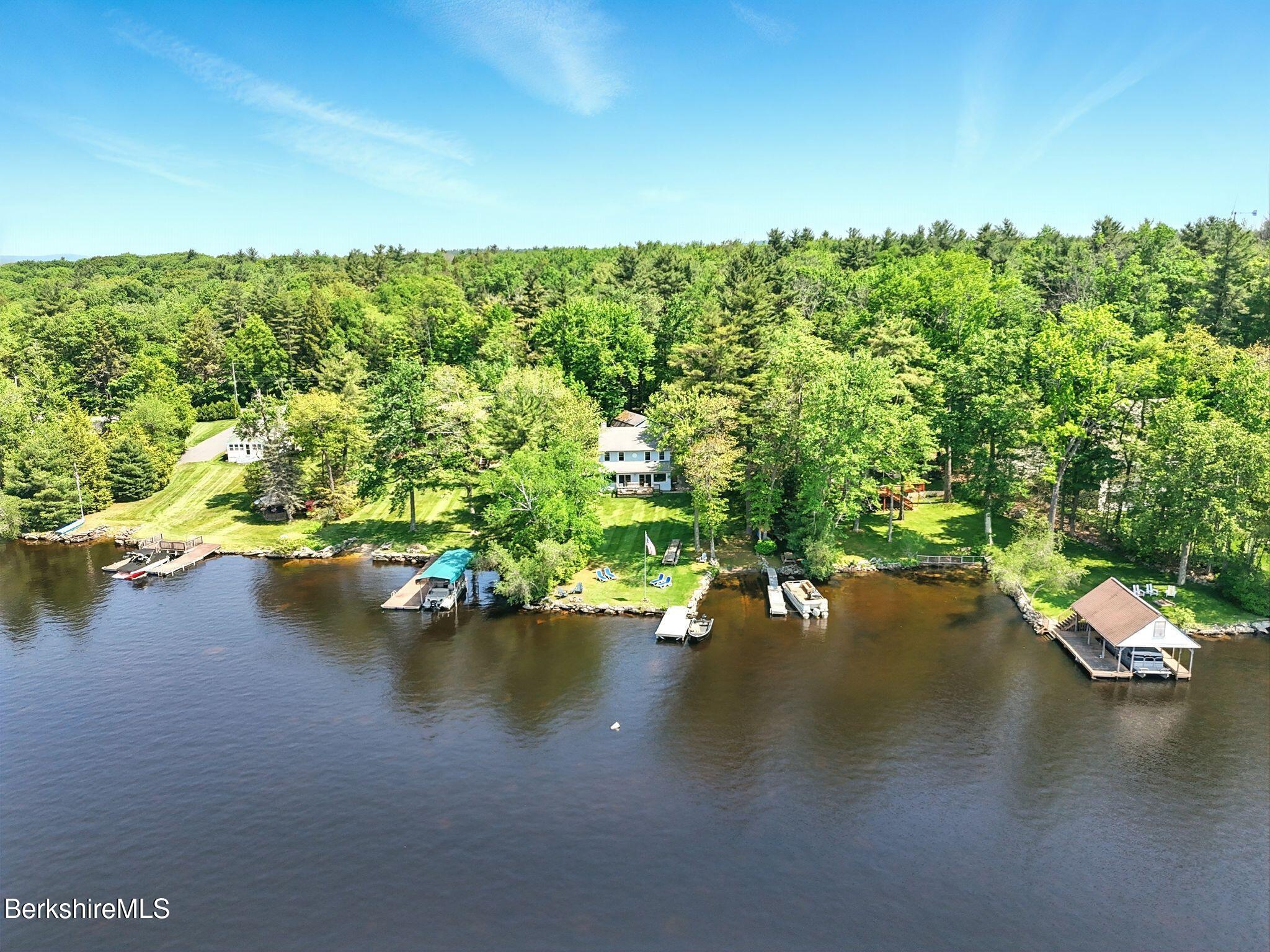 191 Moreau Road Granville, MA 01034 - Photo 2 of 4 a view of a lake with houses