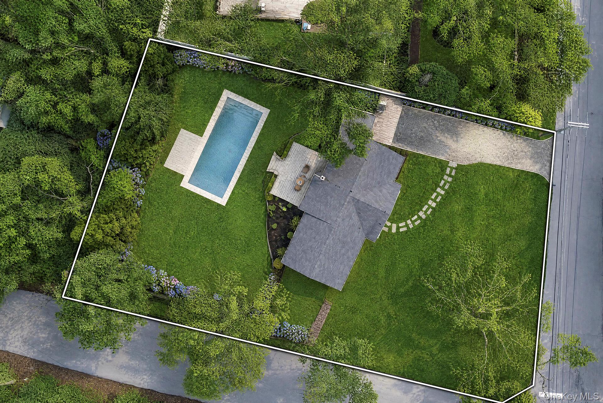 3 Jones Road Hampton Bays, NY 11946 - Photo 17 of 19 a view of a yard with potted plants