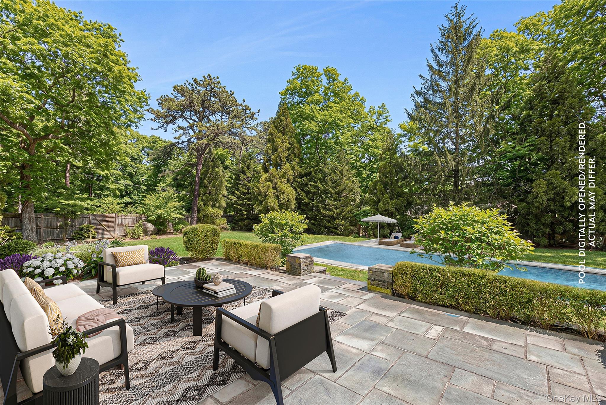3 Jones Road Hampton Bays, NY 11946 - Photo 2 of 19 a view of a patio with table and chairs and a garden