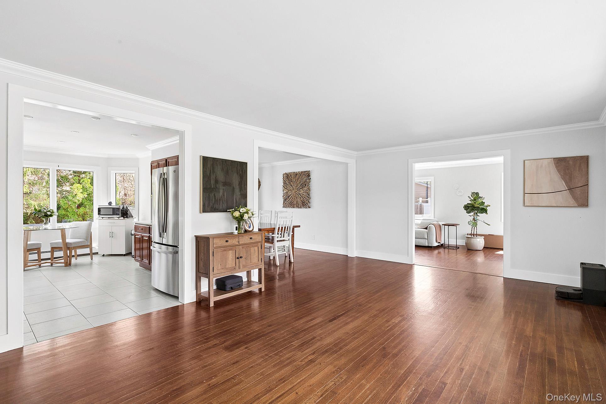 3 Jones Road Hampton Bays, NY 11946 - Photo 7 of 19 a view of a livingroom with furniture and wooden floor