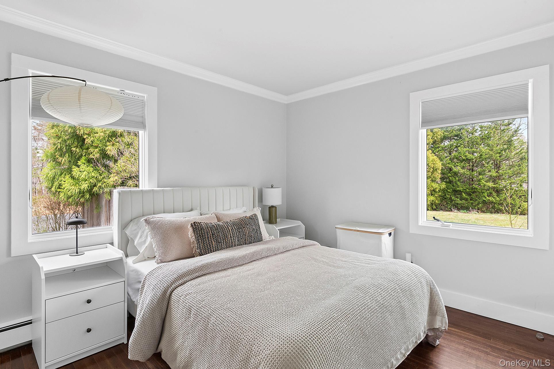 3 Jones Road Hampton Bays, NY 11946 - Photo 10 of 19 a bedroom with a large bed and a window