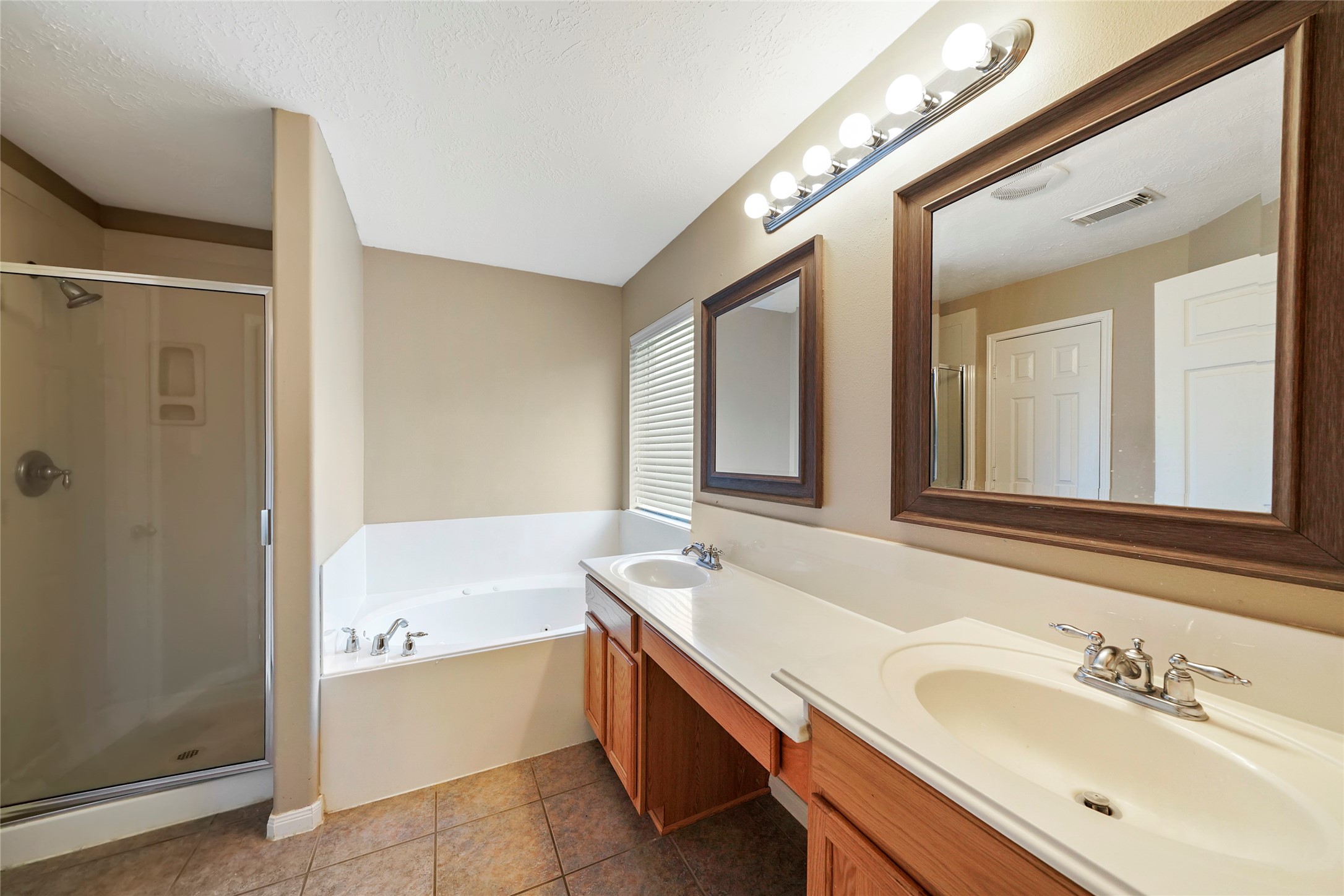 6903 Summer Bridge Lane Spring, TX 77379 - Photo 22 of 35 double sinks in primary. Separate tub and shower.