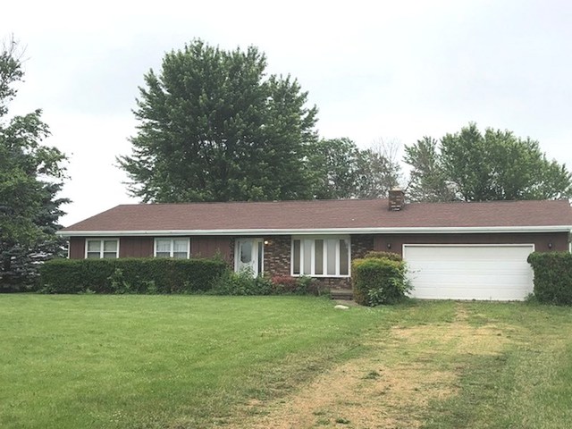 1348 Eldena Road Dixon, IL 61021 - Photo 1 of 20 a front view of a house with a yard