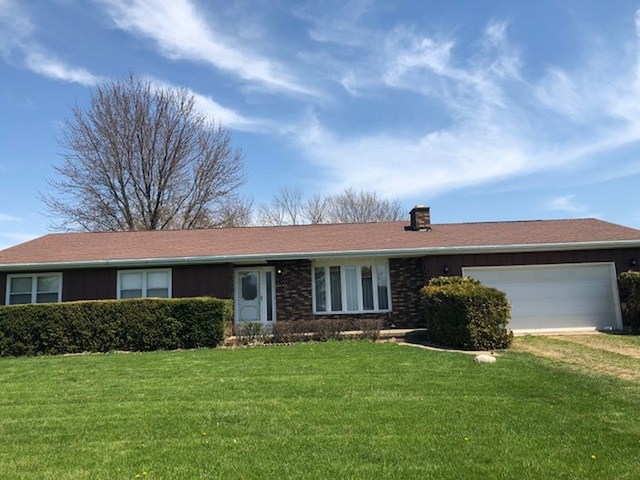 1348 Eldena Road Dixon, IL 61021 - Photo 2 of 20 a view of a house with a backyard