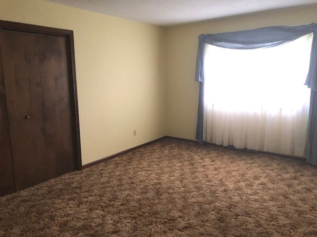 1348 Eldena Road Dixon, IL 61021 - Photo 11 of 20 a view of an empty room and window