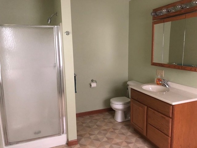 1348 Eldena Road Dixon, IL 61021 - Photo 14 of 20 a bathroom with a toilet sink and mirror