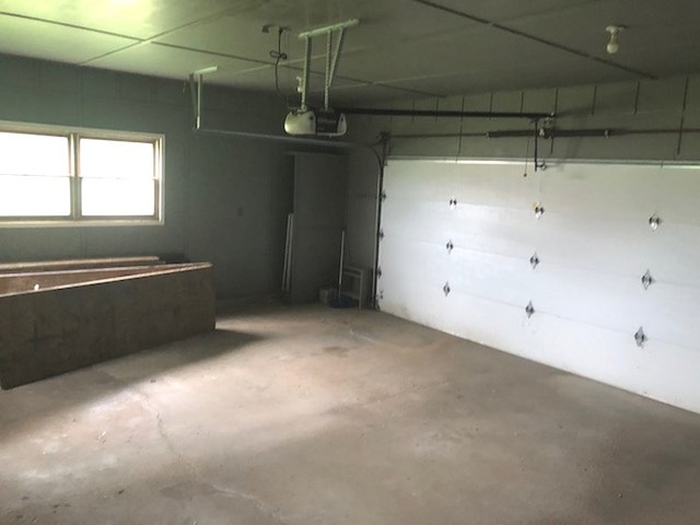 1348 Eldena Road Dixon, IL 61021 - Photo 16 of 20 a view of a refrigerator and window in a room
