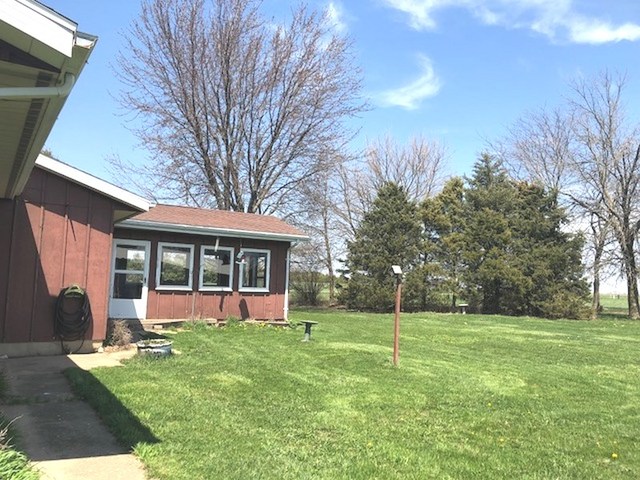 1348 Eldena Road Dixon, IL 61021 - Photo 4 of 20 a view of a house with backyard and trees