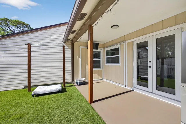 a view of a porch with a backyard