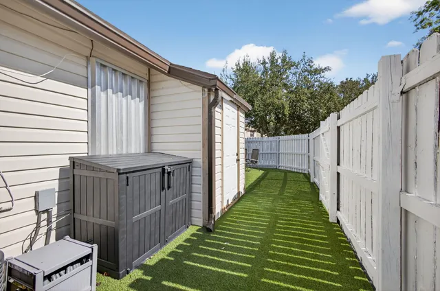a view of a backyard with stairs