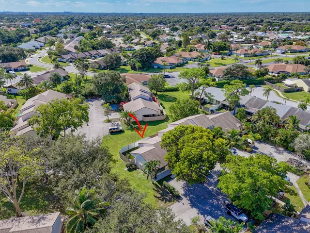 an aerial view of residential house with outdoor space