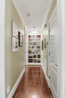 a bathroom with a shower a mirror and a shower