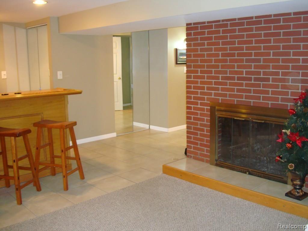 3536 Mason Road Howell, MI 48843 - Photo 18 of 25 Man Cave with Fireplace.jpg