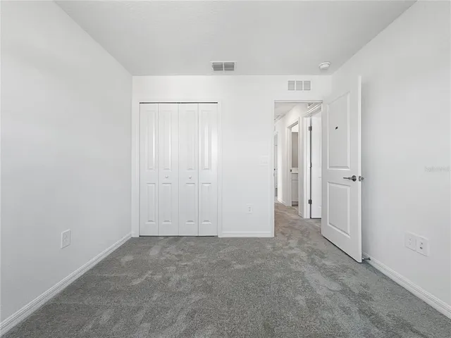 an empty room with an entryway