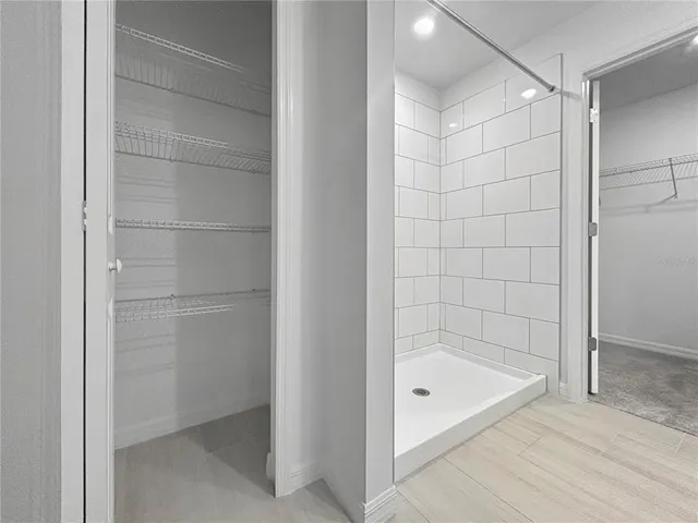 a bathroom with a bath tub