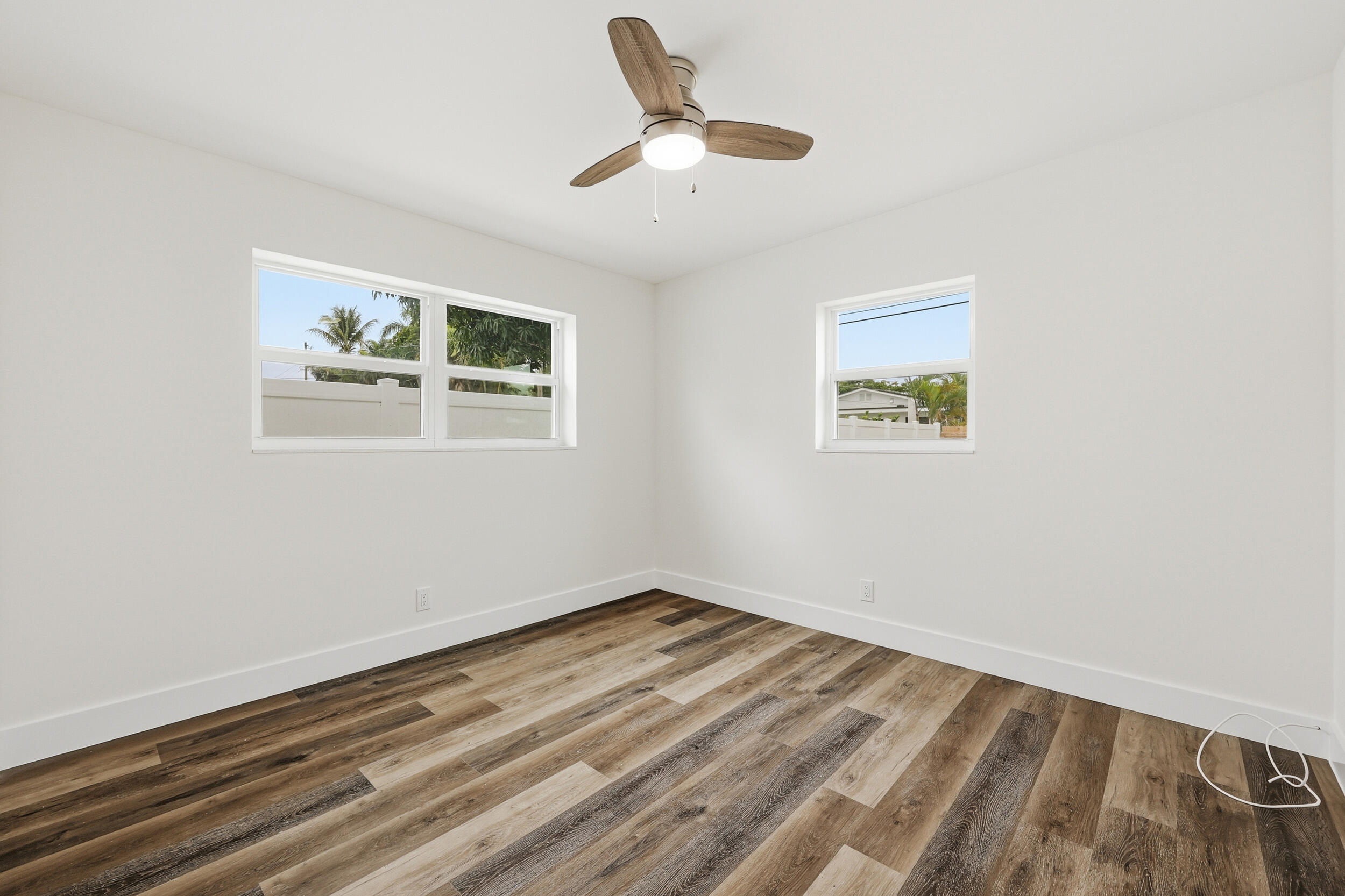 403 Todd Street Jupiter, FL 33458 - Photo 13 of 30 a view of room with window and ceiling fan
