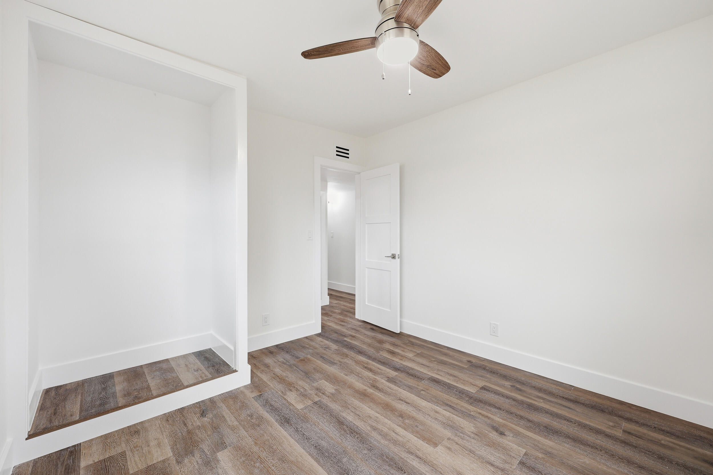 403 Todd Street Jupiter, FL 33458 - Photo 19 of 30 wooden floor in an empty room