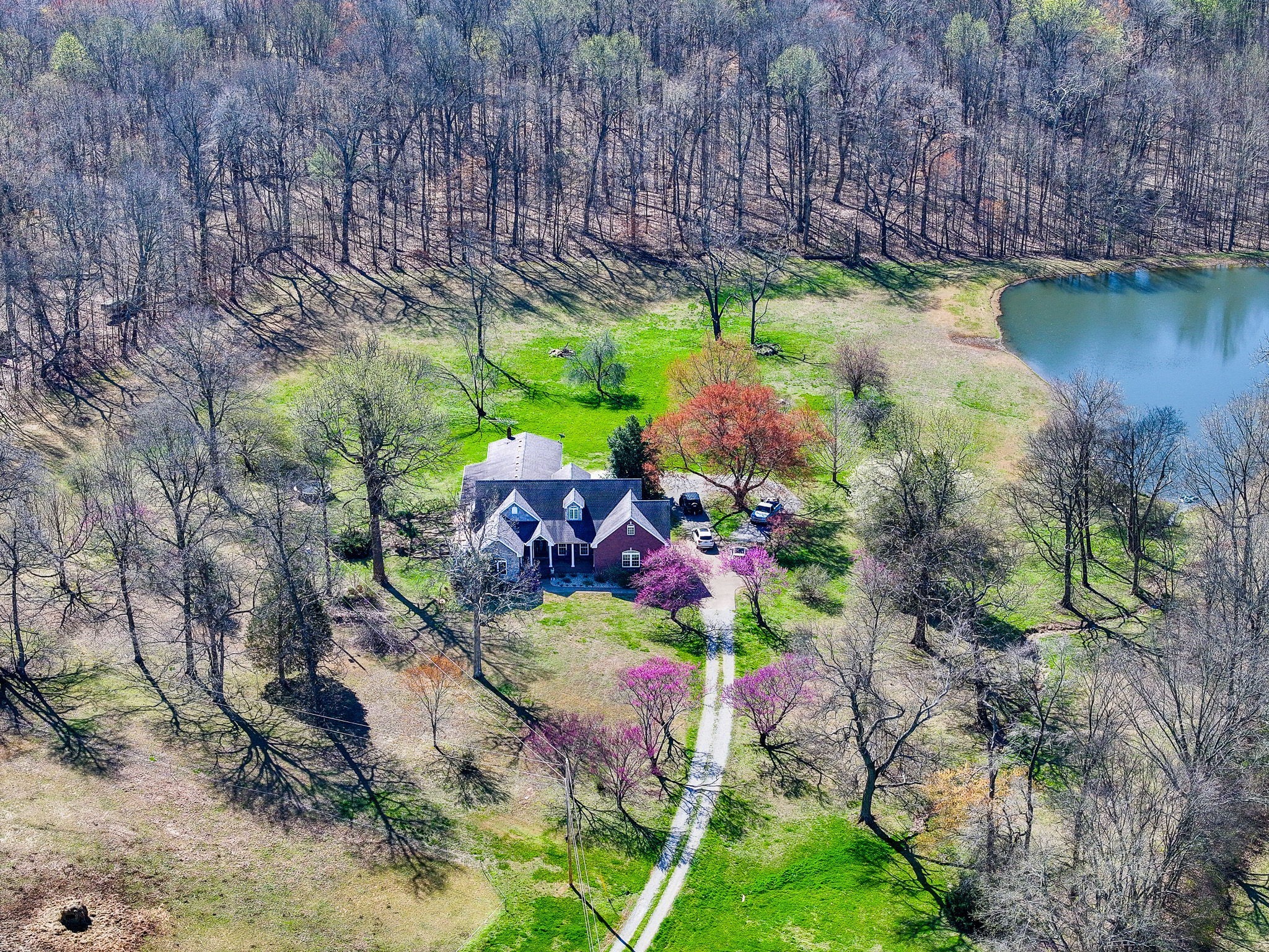 1623 Friendship Road Cross Plains, TN 37049 - Photo 4 of 56 a backyard of a house with lots of green space and fountain