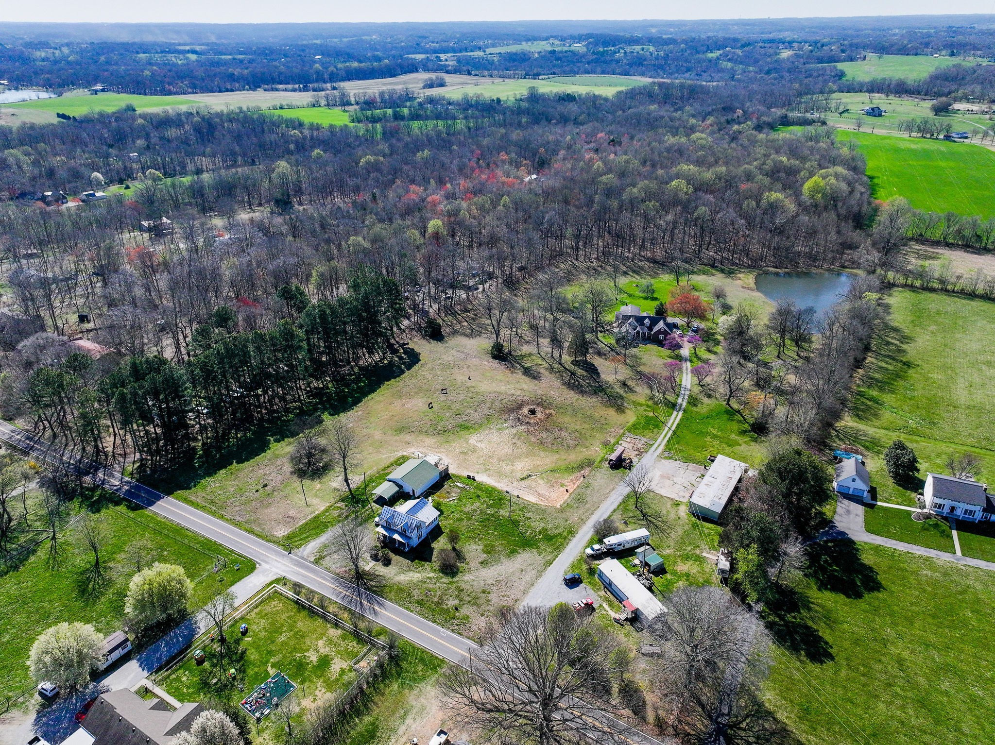 1623 Friendship Road Cross Plains, TN 37049 - Photo 52 of 56 an aerial view of a house with a yard and lake view