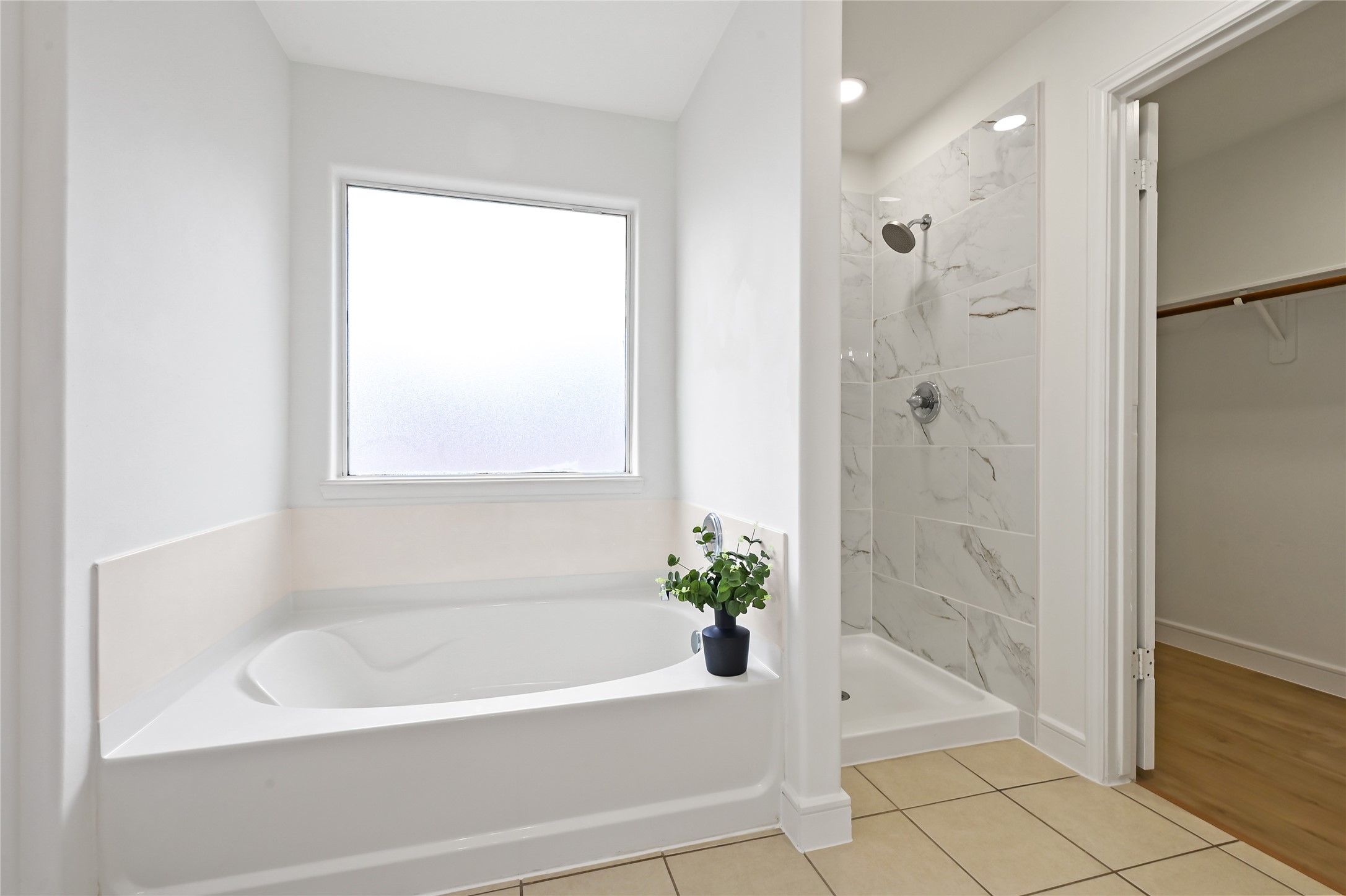 23311 Leafstone Lane Spring, TX 77373 - Photo 17 of 35 Bath and shower combination for ultimate relaxation and convenience.