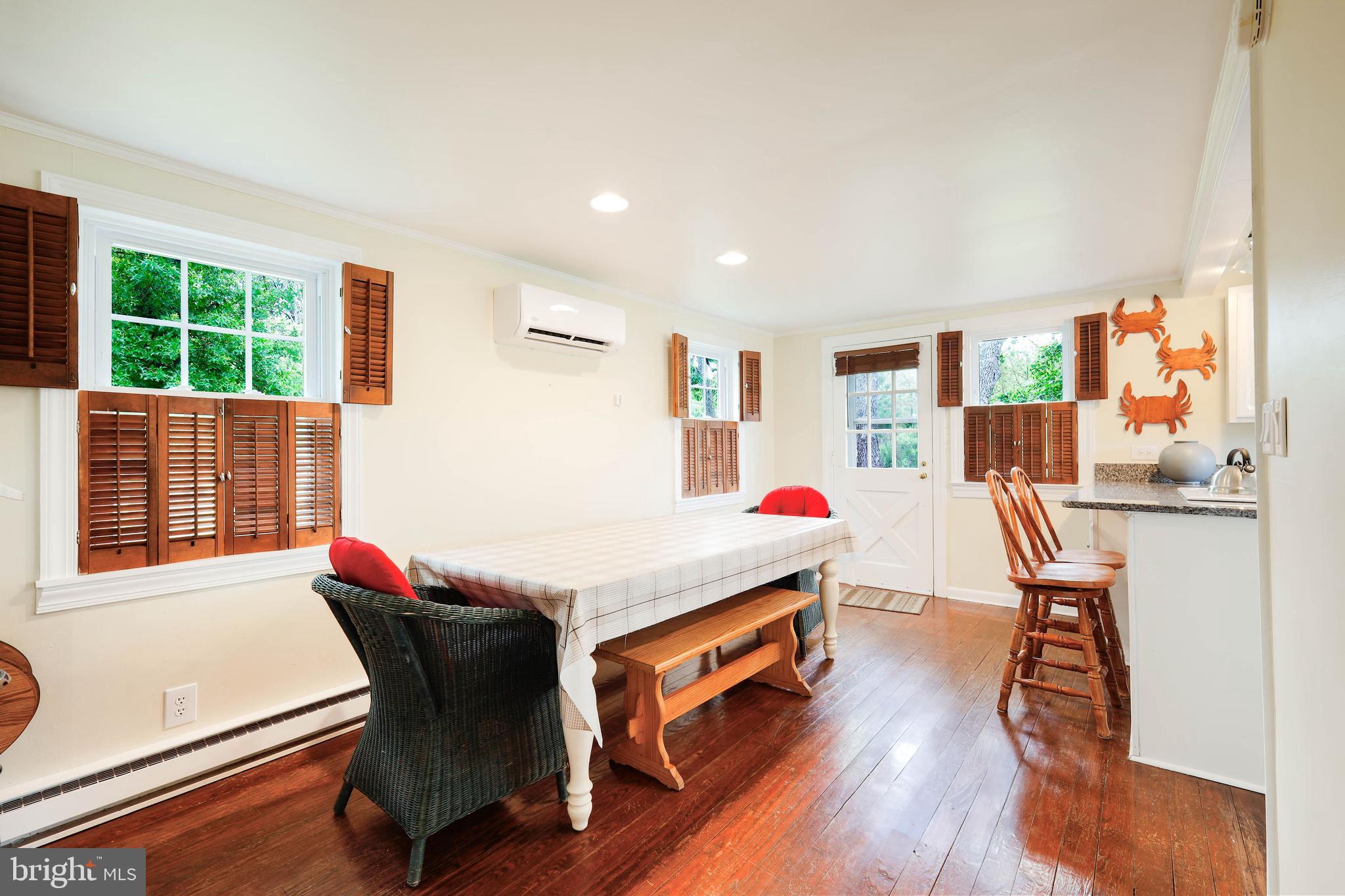 4004 Robinson Neck Road Taylors Island, MD 21669 - Photo 15 of 83 Dining room with hardwood floors