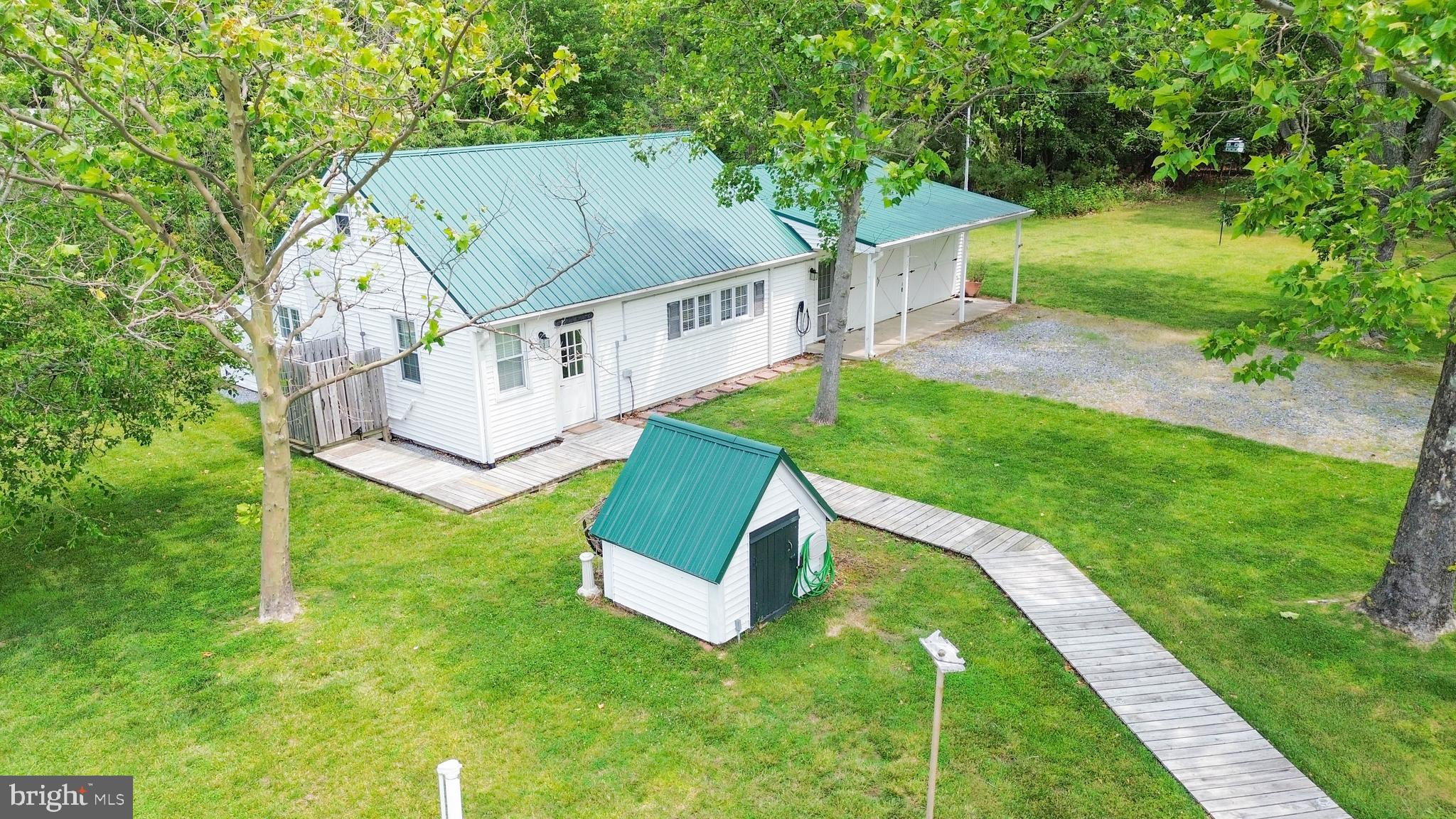 4004 Robinson Neck Road Taylors Island, MD 21669 - Photo 43 of 84 Bunkhouse and pump house