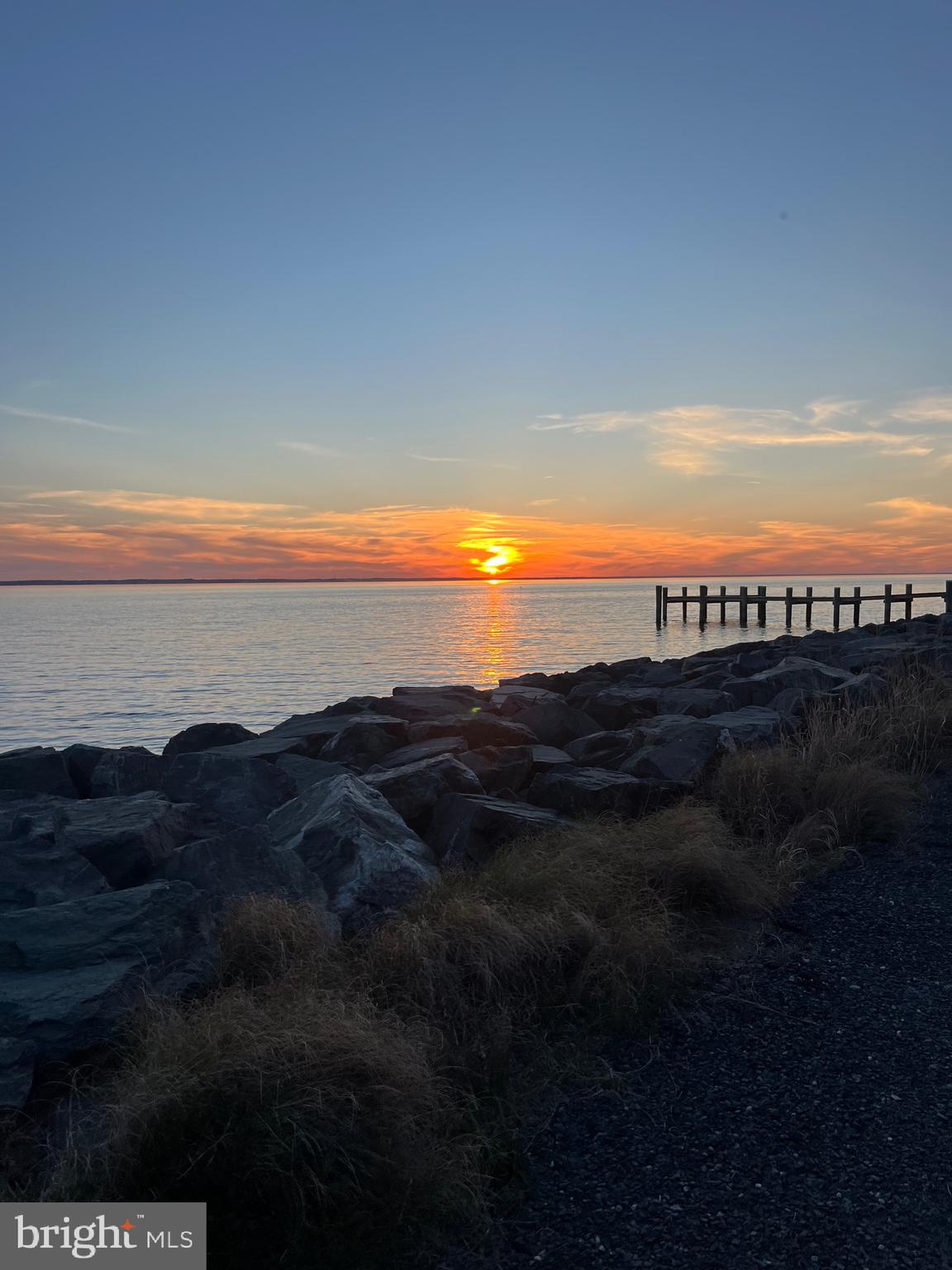 4004 Robinson Neck Road Taylors Island, MD 21669 - Photo 68 of 84 a view of sunset and a lake