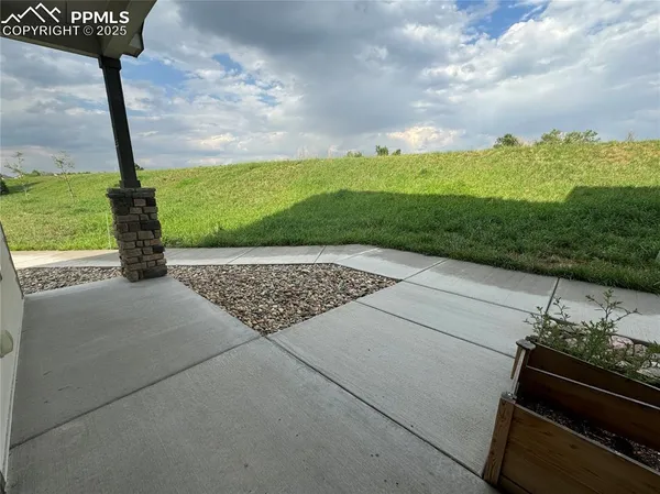 a view of a terrace with a bench