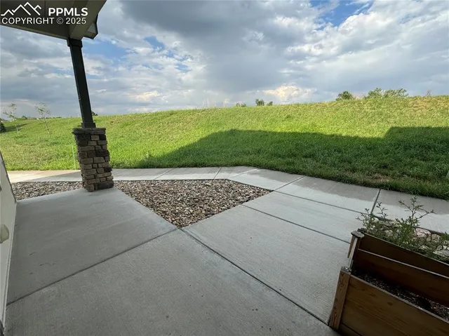 a view of a terrace with a bench