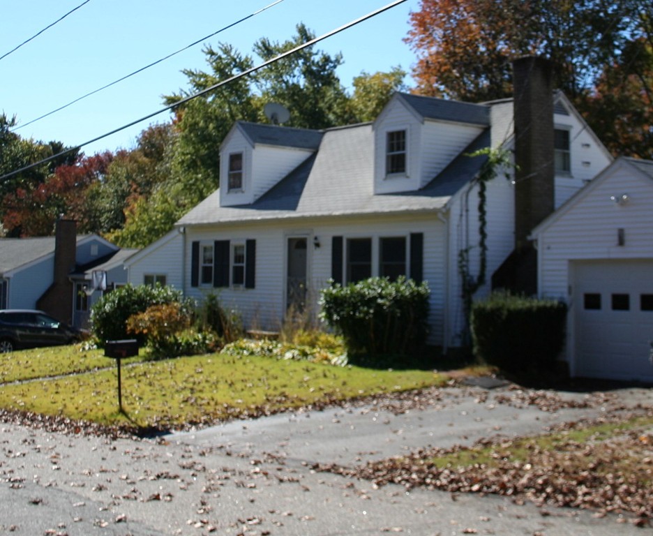 9 Claire Road Amesbury, MA 01913 - Photo 1 of 26 a front view of a house with a yard