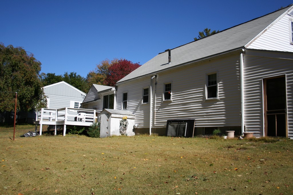 9 Claire Road Amesbury, MA 01913 - Photo 13 of 26 a view of a house with backyard and sitting area