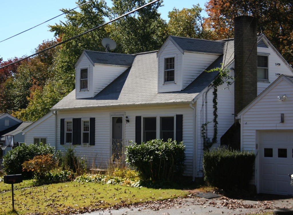 9 Claire Road Amesbury, MA 01913 - Photo 2 of 26 a front view of a house with a yard