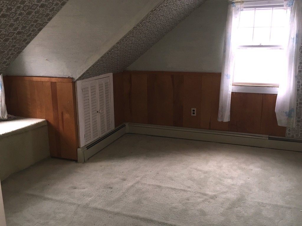 9 Claire Road Amesbury, MA 01913 - Photo 24 of 26 a view of a garage with wooden walls