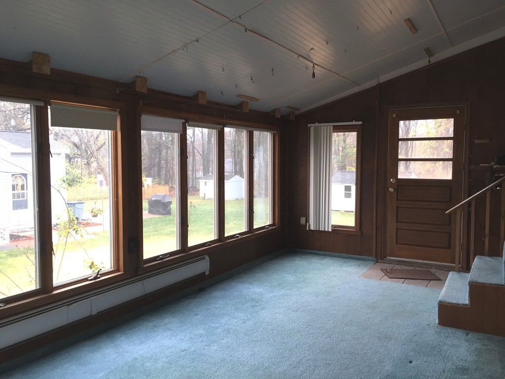 9 Claire Road Amesbury, MA 01913 - Photo 26 of 26 a view of room with balcony and furniture