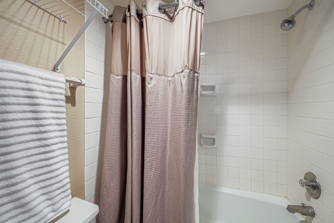 22340 Highway 6, Unit 1784 Keystone, CO 80435 - Photo 14 of 28 a bathroom with a shower and a tub