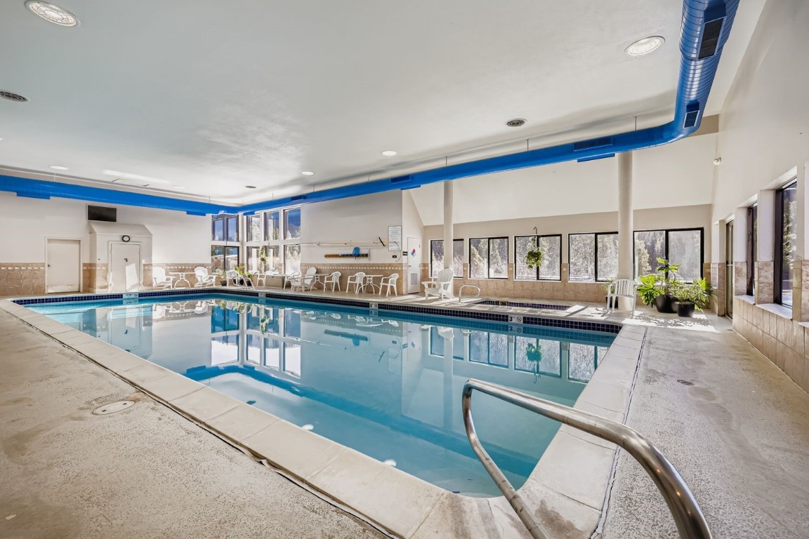 22340 Highway 6, Unit 1784 Keystone, CO 80435 - Photo 25 of 28 a kitchen with stainless steel appliances granite countertop a sink a counter space and cabinets