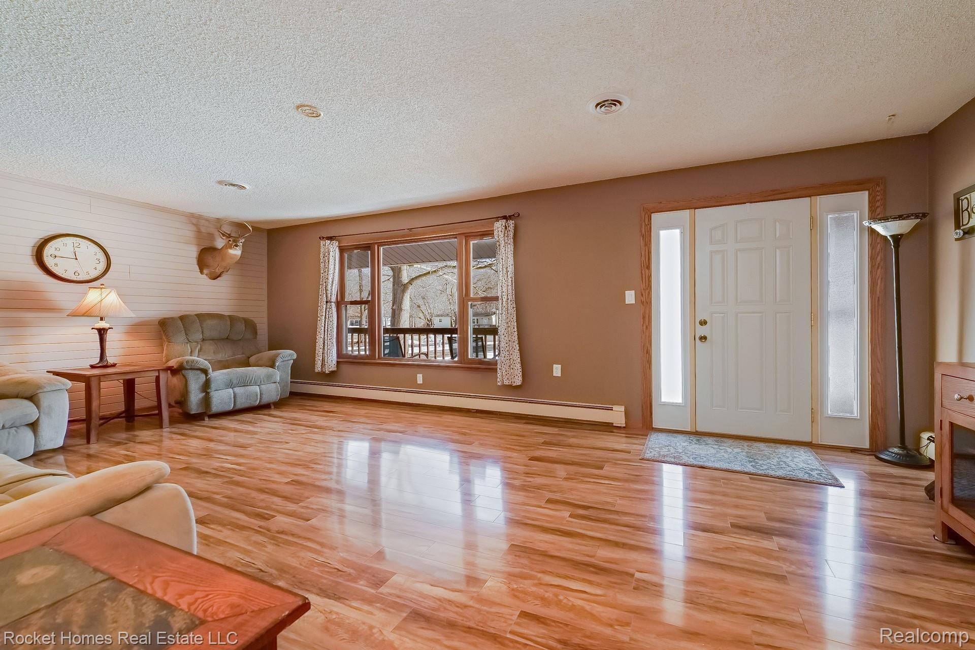 12792 Budd Road Burt, MI 48417 - Photo 4 of 42 003-photo-living-room-8986902.jpg