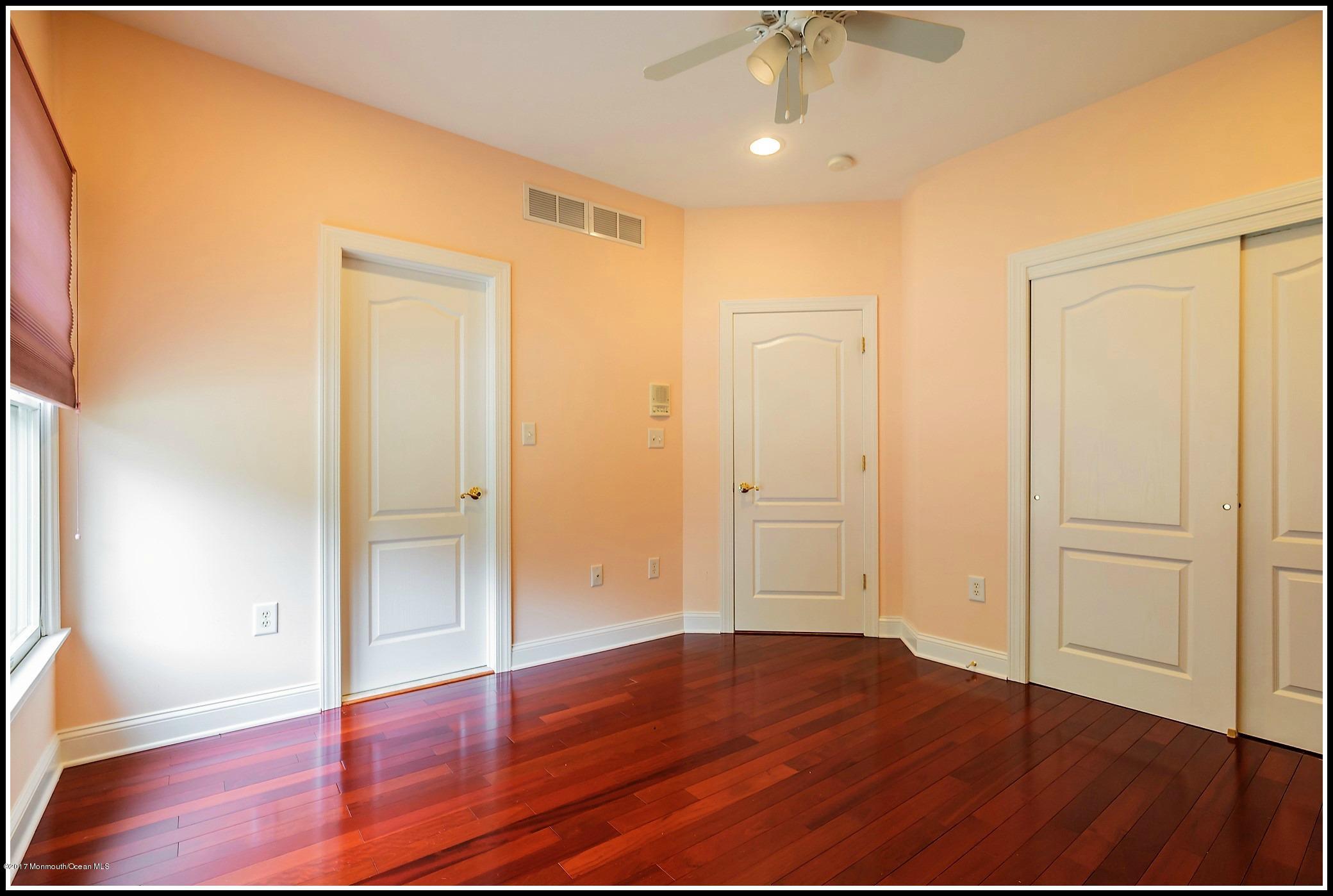 198 Robertsville Road Freehold, NJ 07728 - Photo 17 of 30 a view of empty room with wooden floor