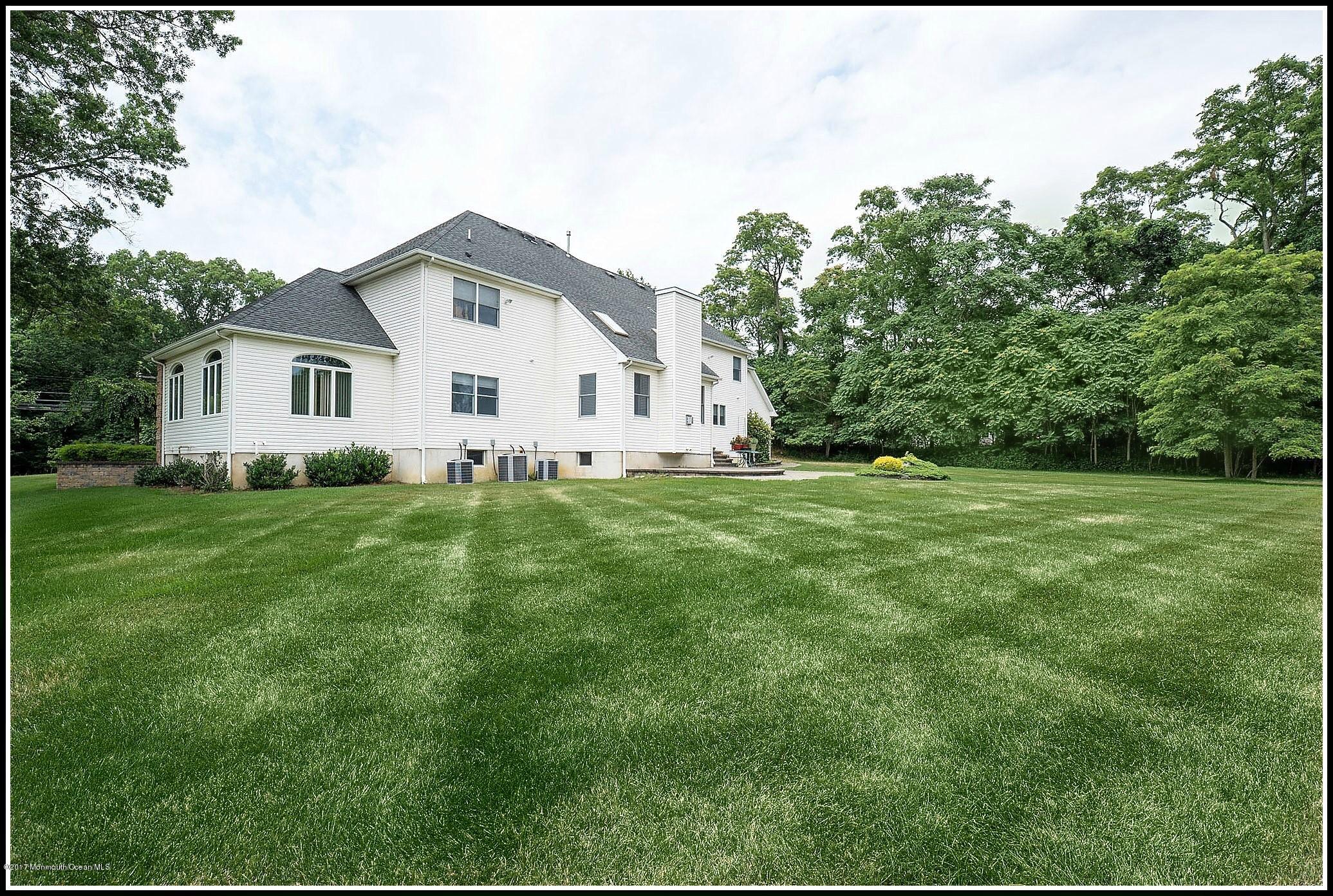 198 Robertsville Road Freehold, NJ 07728 - Photo 30 of 30 a view of a house with a yard