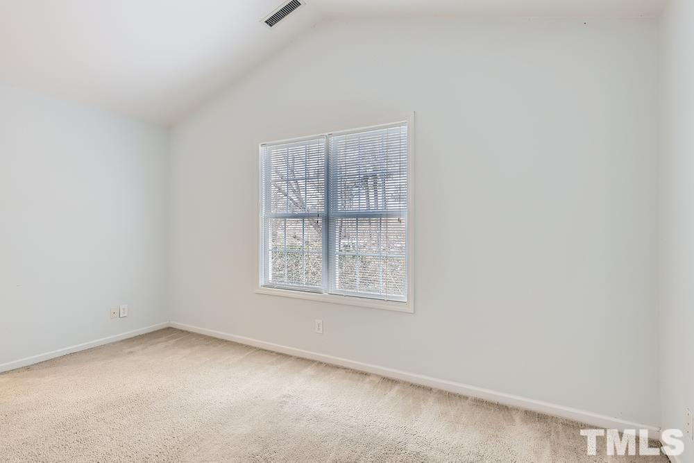 205 Bridgepath Drive Cary, NC 27513 - Photo 18 of 28 an empty room with a window